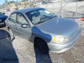 2002 Kia Rio with VIN KNADC123826198670, listed as a IAAI auction lot 41643316 with 1 mi miles. Bid and sale history available at carsss.com. Image 1.