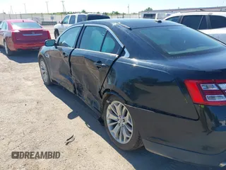 2015 Ford Taurus Limited with VIN 1FAHP2F81FG104493, listed as a IAAI auction lot 42587708 with 152,825 mi miles and . Bid and sale history available at DreamBid. Image 18.