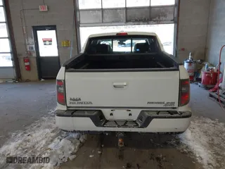 2014 Honda Ridgeline RTL with VIN 5FPYK1F55EB012490, listed as a IAAI auction lot 41391884 with 130,121 mi miles. Bid and sale history available at carsss.com. Image 16.
