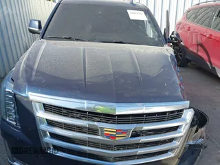 2019 Cadillac Escalade Luxury z VIN 1GYS4BKJ4KR291044, wystawiony jako IAAI lot #41818756 z przebiegiem Nie podano mil oraz . Historia ofert i sprzedaży dostępna na DreamBid. Obrazek 12.
