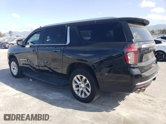 2023 Chevrolet Suburban Premier with VIN 1GNSKFKD8PR205665, listed as a Copart auction lot 51694655 with 27,882 mi miles and Salvage title. Bid and sale history available at DreamBid. Image 2.