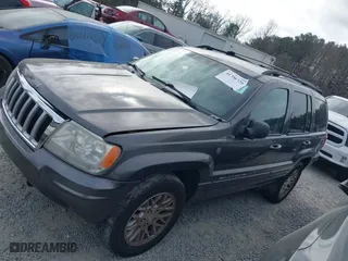 2004 Jeep Grand Cherokee Limited with VIN 1J8GW58N14C391912, listed as a IAAI auction lot 41706729 with 248,806 mi miles. Bid and sale history available at carsss.com. Image 14.