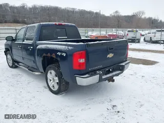 2007 Chevrolet Silverado 1500 LTZ with VIN 2GCEK13M771535698, listed as a IAAI auction lot 41295982 with 216,232 mi miles. Bid and sale history available at carsss.com. Image 3.