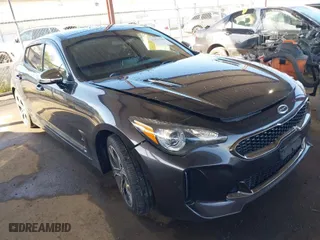 2020 Kia Stinger GT-Line with VIN KNAE15LA7L6074843, listed as a IAAI auction lot 41831509 with 86,410 mi miles. Bid and sale history available at carsss.com. Image 1.