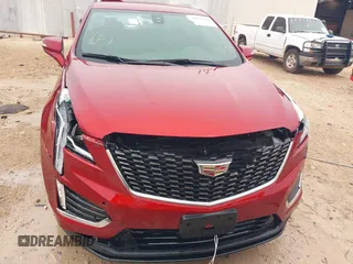 2023 Cadillac XT5 FWD Luxury z VIN 1GYKNAR42PZ147121, wystawiony jako IAAI lot #41315848 z przebiegiem 10 444 mil mil oraz . Historia ofert i sprzedaży dostępna na DreamBid. Obrazek 12.