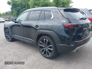 2023 Mazda CX-50 Meridian Edition with VIN 7MMVABXY1PN145913, listed as a IAAI auction lot 42632620 with 23,444 mi miles and . Bid and sale history available at DreamBid. Image 3.