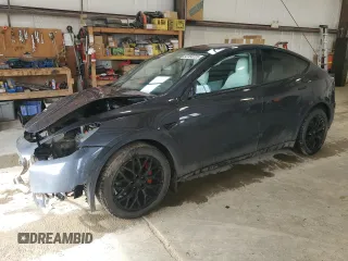 2022 Tesla Model Y Performance z VIN 7SAYGDEF6NF327016, wystawiony jako Copart lot #52150725 z przebiegiem 99 505 mil mil oraz Szkoda całkowita • Salvage title. Historia ofert i sprzedaży dostępna na DreamBid. Obrazek 1.