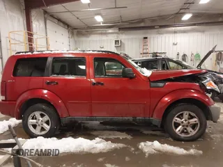 2009 Dodge Nitro SE with VIN 1D8GU28K79W522396, listed as a IAAI auction lot 41399429 with 148,727 mi miles and . Bid and sale history available at DreamBid. Image 13.