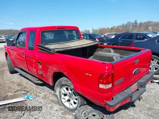 2011 Ford Ranger XLT with VIN 1FTLR4FE5BPA57057, listed as a IAAI auction lot 41995162 with 238,987 mi miles. Bid and sale history available at carsss.com. Image 6.