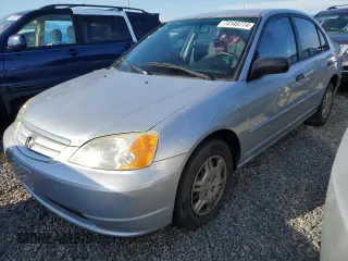 2001 Honda Civic LX with VIN 2HGES16531H595630, listed as a Copart auction lot 74149774 with 50,704 mi miles and Salvage Title. Bid and sale history available at carsss.com. Image 1.