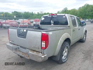 2006 Nissan Frontier SE with VIN 1N6AD07W66C451179, listed as a IAAI auction lot 42320667 with 210,610 mi miles and . Bid and sale history available at DreamBid. Image 4.
