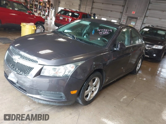 2014 Chevrolet Cruze 1LT with VIN 1G1PC5SBXE7477219, listed as a IAAI auction lot 41970786 with 194,542 mi miles and . Bid and sale history available at DreamBid. Image 2.
