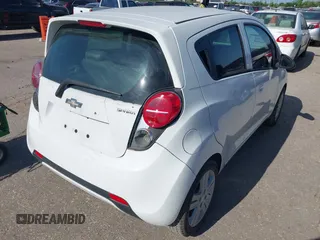 2014 Chevrolet Spark LT with VIN KL8CD6S99EC536525, listed as a IAAI auction lot 41996111 with 81,388 mi miles. Bid and sale history available at carsss.com. Image 4.