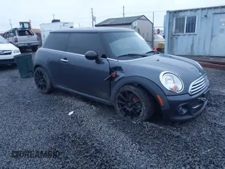 2012 MINI Hardtop with VIN WMWSU3C51CT255259, listed as a IAAI auction lot 41200277 with 103,453 mi miles and . Bid and sale history available at DreamBid. Image 1.