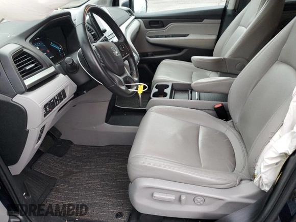 2021 Honda Odyssey EX-L with VIN 5FNRL6H70MB011669, listed as a Copart auction lot 43685815 with 77,542 mi miles and Salvage Title. Bid and sale history available at DreamBid. Image 7.