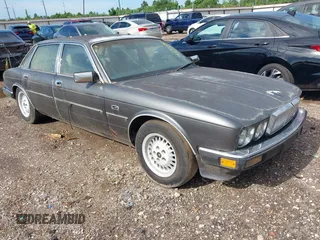 1988 Jaguar XJ with VIN SAJHV1543JC519549, listed as a IAAI auction lot 42354827 with Not provided miles and . Bid and sale history available at DreamBid. Image 1.
