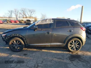 2016 Mazda CX-3 Grand Touring with VIN JM1DKBD74G0115936, listed as a IAAI auction lot 41296104 with 191,408 mi miles. Bid and sale history available at carsss.com. Image 14.