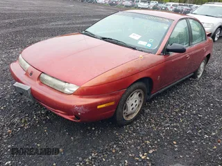 1996 Saturn SL with VIN 1G8ZK5273TZ268401, listed as a IAAI auction lot 42194239 with Not provided miles and . Bid and sale history available at DreamBid. Image 2.