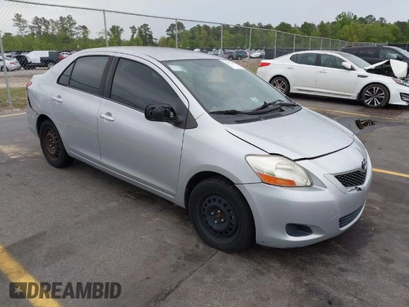 2009 Toyota Yaris with VIN JTDBT903394043218, listed as a IAAI auction lot 41974570 with 281,000 mi miles. Bid and sale history available at carsss.com. Image 1.