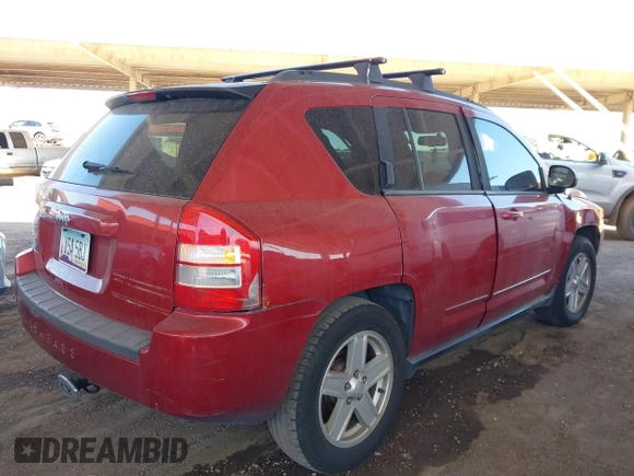 2010 Jeep Compass North Edition with VIN 1J4NF4FB2AD524890, listed as a IAAI auction lot 41842414 with 103,251 mi miles. Bid and sale history available at carsss.com. Image 4.