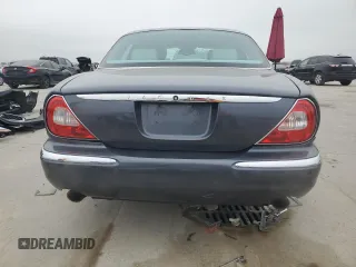 2004 Jaguar XJ with VIN SAJWA71C04SG22878, listed as a Copart auction lot 44383205 with 127,515 mi miles and Clean Title. Bid and sale history available at carsss.com. Image 6.