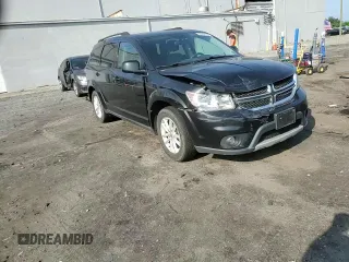 2013 Dodge Journey SXT with VIN 3C4PDCBG4DT619319, listed as a Copart auction lot 62964135 with 140,620 mi miles and Salvage title. Bid and sale history available at DreamBid. Image 14.