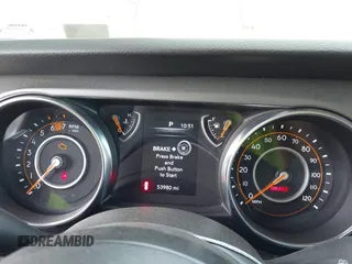 2023 Jeep Wrangler Sport S with VIN 1C4HJXDN6PW599895, listed as a IAAI auction lot 42242107 with 53,980 mi miles and . Bid and sale history available at DreamBid. Image 7.
