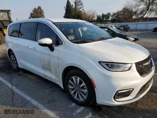 2023 Chrysler Pacifica Hybrid Touring L with VIN 2C4RC1L72PR592594, listed as a Copart auction lot 43285825 with 30,309 mi miles and Salvage Title. Bid and sale history available at carsss.com. Image 4.
