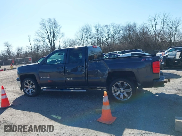 2014 Chevrolet Silverado 1500 LT with VIN 1GCVKREC0EZ377177, listed as a IAAI auction lot 41683600 with 148,672 mi miles and . Bid and sale history available at DreamBid. Image 14.
