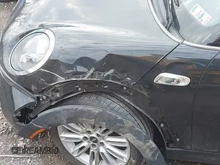 2019 MINI Hardtop Cooper S z VIN WMWXP7C54K2A53043, wystawiony jako IAAI lot #41794566 z przebiegiem 42 278 mil mil oraz . Historia ofert i sprzedaży dostępna na DreamBid. Obrazek 22.