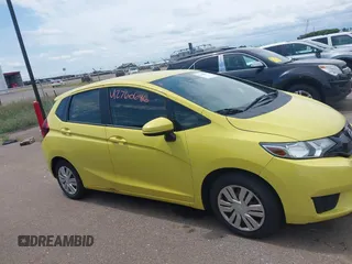 2015 Honda Fit LX z VIN 3HGGK5H58FM768970, wystawiony jako IAAI lot #42760686 z przebiegiem 89 531 mil mil oraz . Historia ofert i sprzedaży dostępna na DreamBid. Obrazek 13.