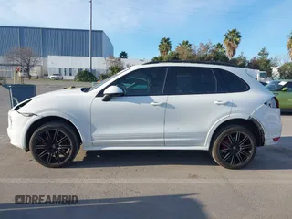 2013 Porsche Cayenne GTS with VIN WP1AD2A22DLA71143, listed as a IAAI auction lot 41287138 with 143,434 mi miles and . Bid and sale history available at DreamBid. Image 15.