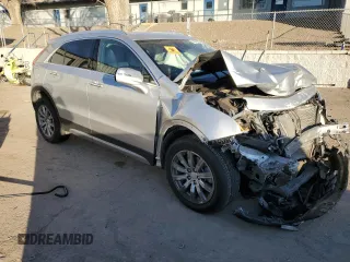 2022 Cadillac XT4 AWD Premium Luxury with VIN 1GYFZDR49NF116972, listed as a Copart auction lot 84223184 with 42,584 mi miles and Salvage Title. Bid and sale history available at carsss.com. Image 4.