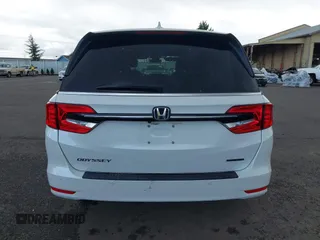 2022 Honda Odyssey Touring with VIN 5FNRL6H8XNB057293, listed as a IAAI auction lot 41826014 with 30,454 mi miles and . Bid and sale history available at DreamBid. Image 16.