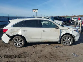 2014 Acura MDX Advance with VIN 5FRYD4H8XEB043793, listed as a IAAI auction lot 41092262 with 140,792 mi miles and . Bid and sale history available at carsss.com. Image 13.