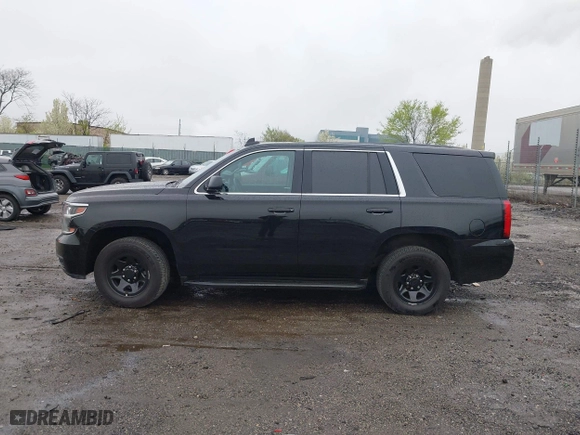 2015 Chevrolet Tahoe Commercial with VIN 1GNSK2EC8FR570602, listed as a IAAI auction lot 41977021 with 115,866 mi miles. Bid and sale history available at carsss.com. Image 14.