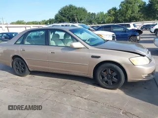 2001 Toyota Avalon XL z VIN 4T1BF28B31U185174, wystawiony jako IAAI lot #42338204 z przebiegiem 298 540 mil mil oraz . Historia ofert i sprzedaży dostępna na DreamBid. Obrazek 13.
