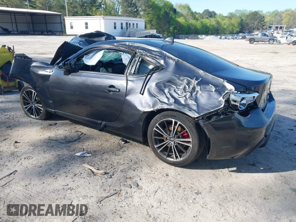 2015 Scion FR-S with VIN JF1ZNAA10F8707671, listed as a IAAI auction lot 42000130 with 136,734 mi miles. Bid and sale history available at carsss.com. Image 3.