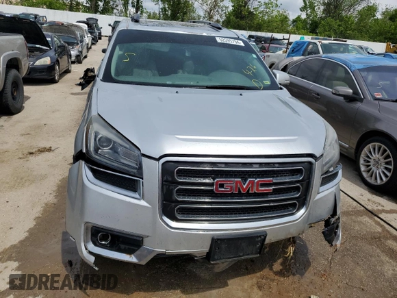 2014 GMC Acadia SLT z VIN 1GKKVRKDXEJ357660, wystawiony jako Copart lot #52595794 z przebiegiem 180 509 mil mil oraz Szkoda całkowita • Salvage title. Historia ofert i sprzedaży dostępna na DreamBid. Obrazek 5.