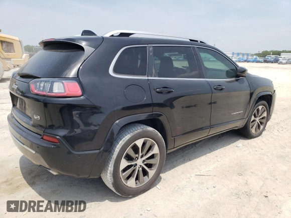 2019 Jeep Cherokee z VIN 1C4PJLJN0KD215834, wystawiony jako Copart lot #57652975 z przebiegiem 127 986 mil mil oraz Czysty tytuł • Clean title. Historia ofert i sprzedaży dostępna na DreamBid. Obrazek 3.