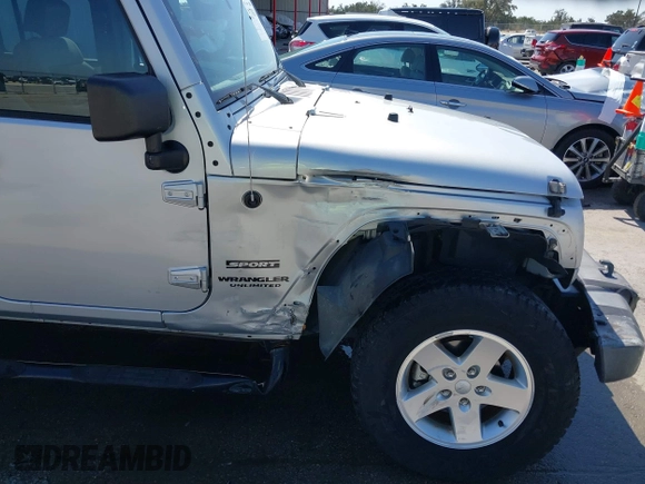 2010 Jeep Wrangler Unlimited Sport with VIN 1J4BA3H17AL211887, listed as a IAAI auction lot 41778324 with 185,626 mi miles. Bid and sale history available at carsss.com. Image 17.