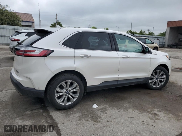 2019 Ford Edge Titanium z VIN 2FMPK4K94KBB36107, wystawiony jako Copart lot #56842925 z przebiegiem 75 348 mil mil oraz Szkoda całkowita • Salvage title. Historia ofert i sprzedaży dostępna na DreamBid. Obrazek 3.