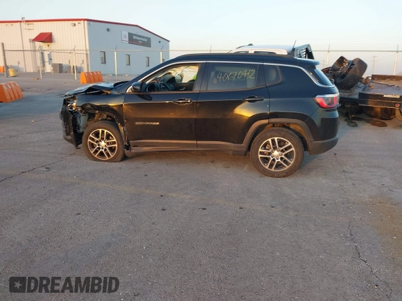 2017 Jeep Compass Latitude with VIN 3C4NJDBB8HT664781, listed as a IAAI auction lot 40670412 with 125,593 mi miles. Bid and sale history available at carsss.com. Image 15.