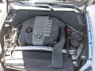 2012 BMW X5 35d with VIN 5UXZW0C58CL671141, listed as a IAAI auction lot 42644381 with 127,464 mi miles and . Bid and sale history available at DreamBid. Image 10.