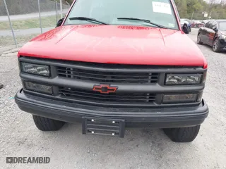 1996 Chevrolet Tahoe with VIN 3GNEK18R8TG153872, listed as a IAAI auction lot 41913476 with 120,686 mi miles. Bid and sale history available at carsss.com. Image 12.