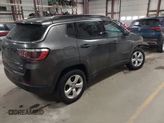 2018 Jeep Compass Latitude z VIN 3C4NJDBB8JT202632, wystawiony jako IAAI lot #41650505 z przebiegiem 118 777 mil mil oraz . Historia ofert i sprzedaży dostępna na DreamBid. Obrazek 4.