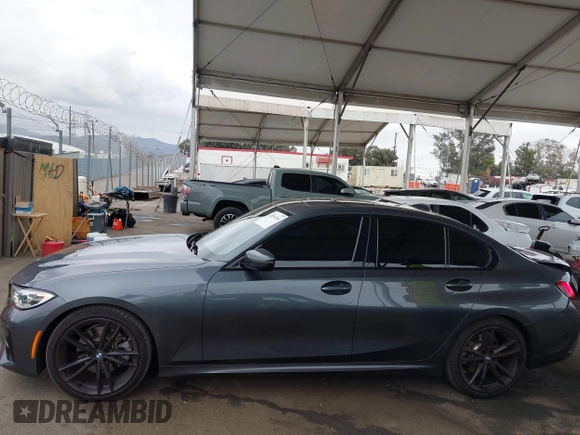 2019 BMW 3 Series 330i with VIN WBA5R1C56KAK07317, listed as a IAAI auction lot 42034264 with 43,448 mi miles and . Bid and sale history available at DreamBid. Image 14.