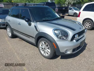 2014 MINI Countryman S z VIN WMWZC5C52EWP36667, wystawiony jako IAAI lot #42541120 z przebiegiem 149 331 mil mil oraz . Historia ofert i sprzedaży dostępna na DreamBid. Obrazek 1.