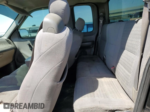 2003 Ford F-150 XL z VIN 2FTRX18W83CB15153, wystawiony jako Copart lot #52976575 z przebiegiem Nie podano mil oraz Szkoda całkowita • Salvage title. Historia ofert i sprzedaży dostępna na DreamBid. Obrazek 10.