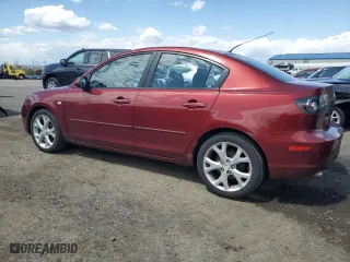 2009 Mazda Mazda3 i Touring Value with VIN JM1BK32G991189995, listed as a Copart auction lot 52284335 with 206,389 mi miles and Salvage Title. Bid and sale history available at carsss.com. Image 2.